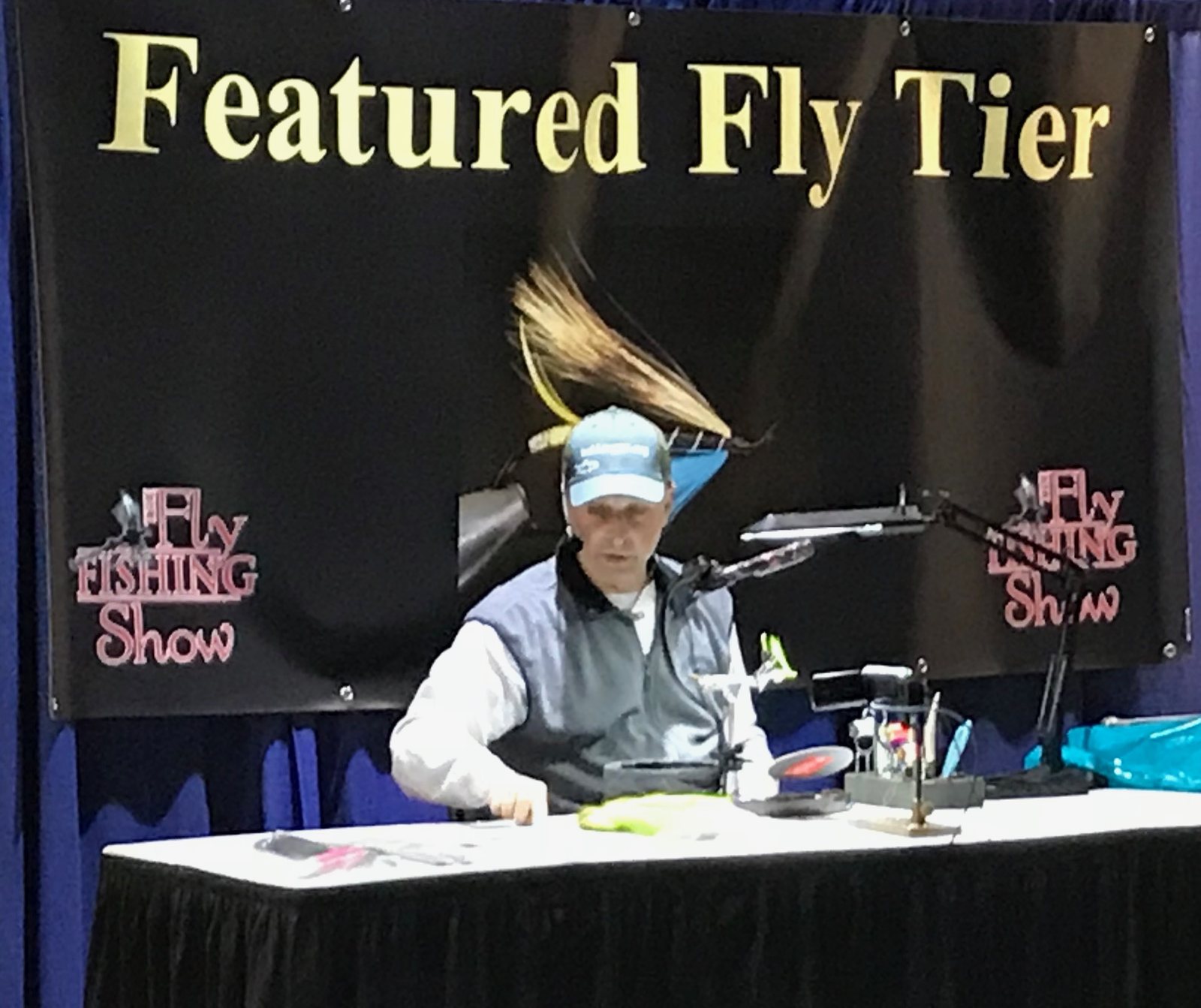 Henry Cowen tying flies as the Featured Fly Tier at the Fly Fishing Show